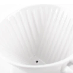 Kalita Style 102 Ceramic Coffee Dripper - White 15 Kalita Style 102 Ceramic Coffee Dripper - White -Delicious Coffee kalita ceramic 102 close up 1 fcd5d7ec 7980 4c82 a31c a2973d2cd5a8